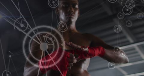 Futuristic Sport Concept: Man Wrapping Hands with Digital Overlay - Download Free Stock Images Pikwizard.com