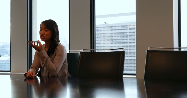 Businesswoman Talking on Phone in Conference Room - Download Free Stock Images Pikwizard.com