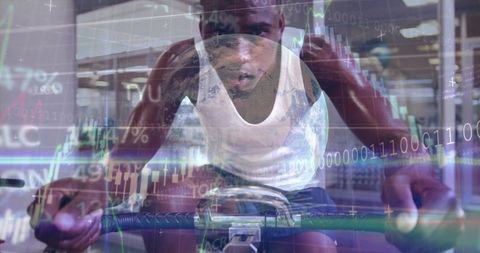 High-intensity indoor cycling with digital data overlays tracking performance analytics