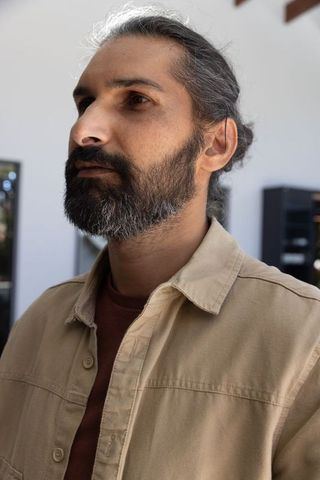 Modern professional man in contemplative pose