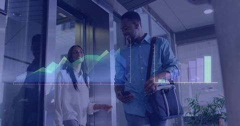 Mixed Race Professionals Using Business Data Visualization in Modern Office