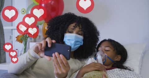 Mother and Daughter Connected Online During Recovery