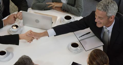 Successful Business Deal Two Professionals Shaking Hands Meeting