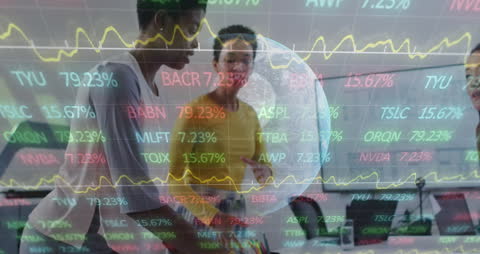 Diverse Female Coworkers Analyzing Financial Data