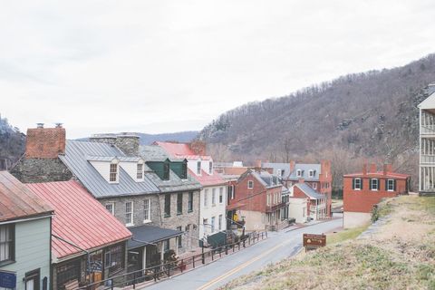 Historic main street in mountain town with colorful metal roofs and period buildings