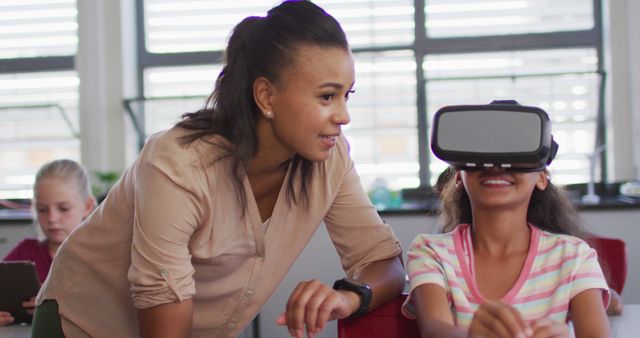 Teacher Assists Student Using Virtual Reality in Classroom - Download Free Stock Images Pikwizard.com