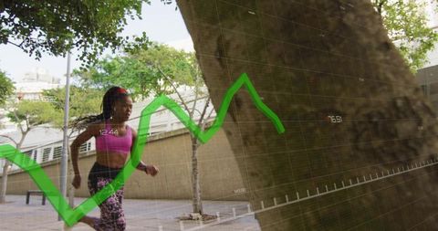 Urban runner jogging along tree-lined plaza with green fitness data overlay and copy space