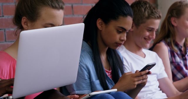 Teenagers Using Digital Devices for Studying and Socializing - Download Free Stock Images Pikwizard.com