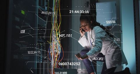 Female Programmer Analyzing Server Data with Holographic Display - Download Free Stock Images Pikwizard.com