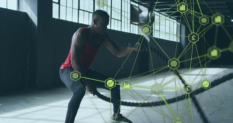 Man exercising with ropes in digital network overlay