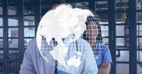 Global healthcare team collaborating with digital 3d globe hologram in hospital corridor