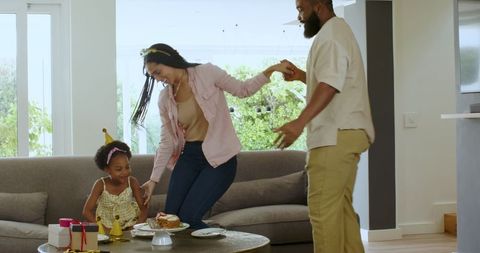 Joyful Family Birthday Celebration at Home with Young Daughter