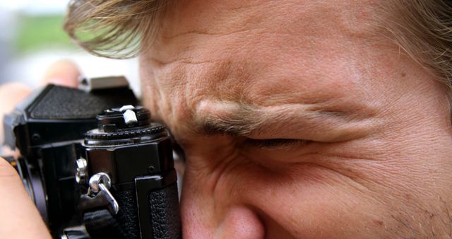 Close up of Photographer Taking a Picture with a Vintage Camera - Download Free Stock Images Pikwizard.com