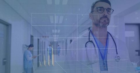 Innovative Healthcare Professional Analyzing Data in Hospital Corridor