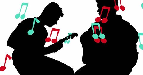 Abstract Silhouettes of Men Playing Guitar with Colorful Musical Notes