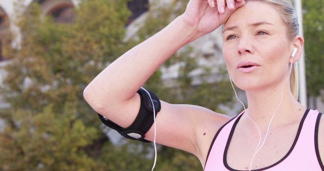 Young Woman Taking a Break During Outdoor Workout - Download Free Stock Images Pikwizard.com