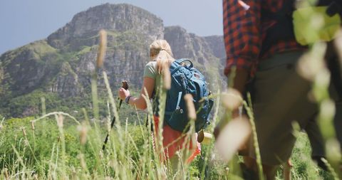 Adventurous Couple Hiking Through Majestic Mountain Scenery - Download Free Stock Images Pikwizard.com