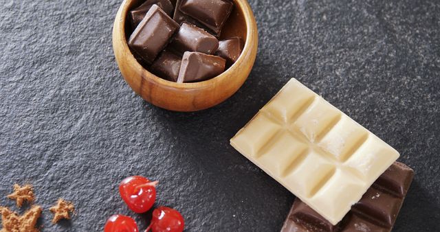 Assorted Chocolate Pieces with Cherries on Slate Background - Download Free Stock Images Pikwizard.com