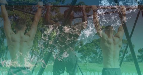 Group of Young Men Exercising Pull-ups Outdoors in Park