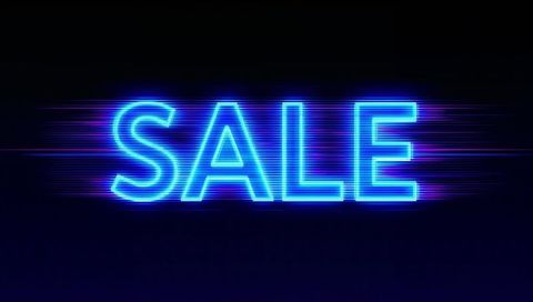 Glowing neon sale sign pulsing with electric blue glow and futuristic motion streaks