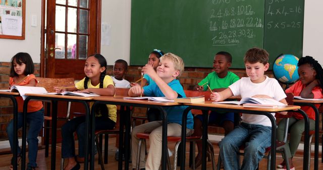 Diverse Group of Students Engaged in Classroom Learning - Download Free Stock Images Pikwizard.com