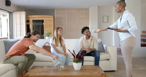 Diverse Friends Chatting Comfortably in Modern Home