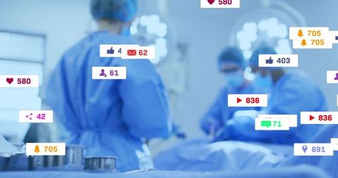 Surgical team performing operation in modern or with floating social media notifications