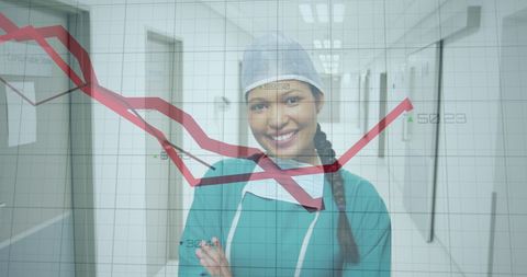 Smiling Nurse With Arms Crossed in Hospital and Overlay of Financial Chart