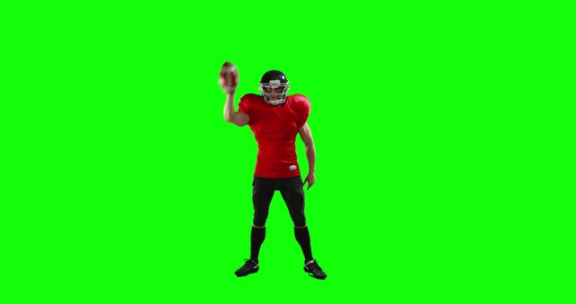 American football player in full uniform holding a ball on green screen background. Use for sports promotions, advertising, graphic design, and video editing requiring football imagery.