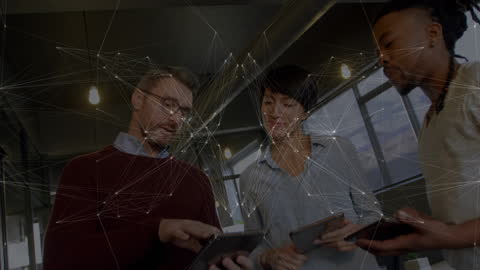 Diverse Team Collaborating with Digital Network Overlay in Office