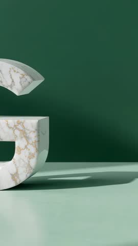 Vertical video panning right with marble letter G drifting left on minimalist green platform
