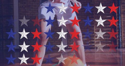 Female Basketball Player Training with Colorful Star Graphics
