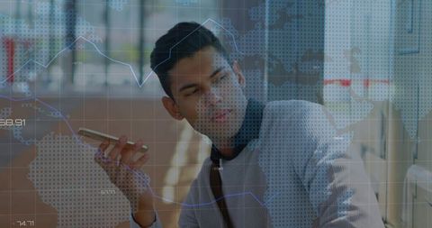 Professional holding smartphone with global data overlay in modern office