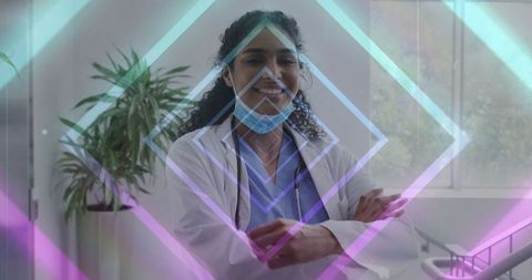 Confident doctor in clinic adorned with geometric glow