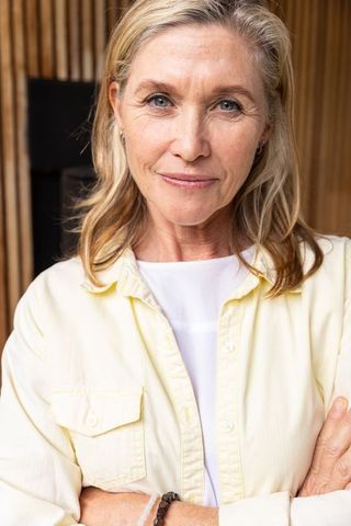 Elegant Senior Woman Embodying Natural Beauty and Confidence Indoors