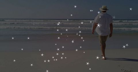 Man Strolling Barefoot on Serene Beach with Starry Overlay