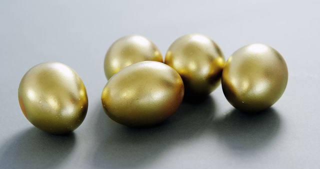 Golden Eggs on Grey Surface - Download Free Stock Images Pikwizard.com