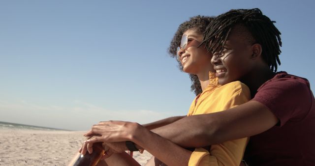 Young Couple Embracing on Beach with Scenic View - Download Free Stock Images Pikwizard.com