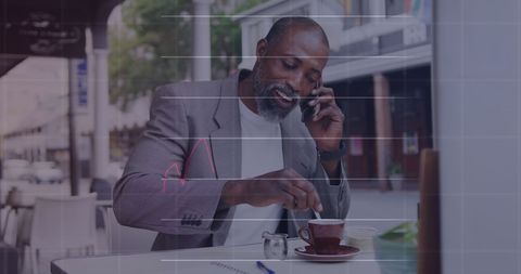 Businessman in Suit Enjoying Coffee Call at Cafe