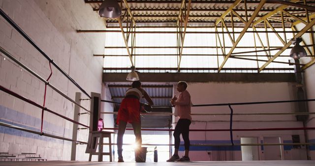 Boxer Resting in Training Gym with Coach at Dawn - Download Free Stock Images Pikwizard.com