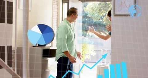 Man welcoming guest with rolling suitcase at sunny foyer while analytics charts overlay
