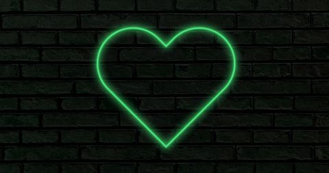 Green Neon Heart Glowing on Dark Background Symbolizing Love - Download Free Stock Images Pikwizard.com