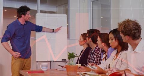 Team Leader Presenting Strategy in Modern Office Meeting Room