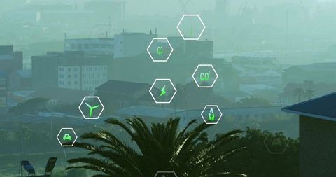 Urban sustainability concept with teal hexagon icons over palm tree and industrial skyline