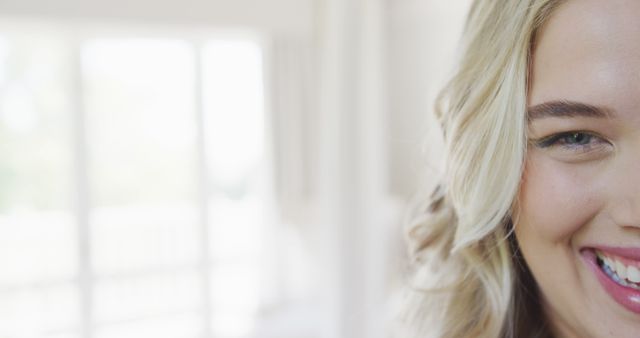 Smiling Woman with Blonde Wavy Hair, Close-up - Download Free Stock Images Pikwizard.com