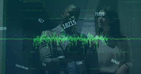 Business Professionals Analyzing Financial Data and Graphs