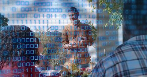 Presenting neighborhood leader holding tablet on front porch with digital binary overlay