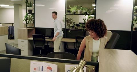 Casual Coworker Interaction in Modern Office Environment