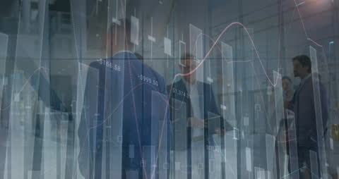 Business Professionals Analyzing Market Trends Monitored on Screen