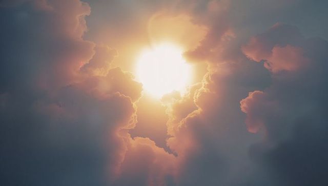 Sunlight Breaking Through Dramatic Cumulus Clouds